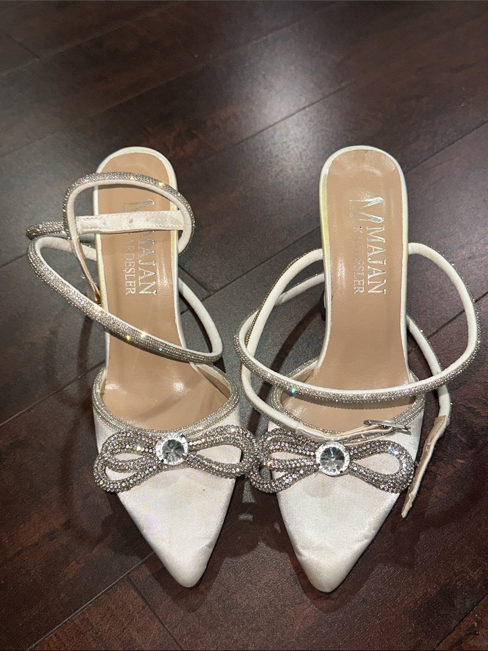 White Pointed Ankle-Strap Heels with Jeweled Bow
